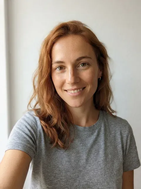 Sample selfie of an AI-generated model with copper hair, used for this example report